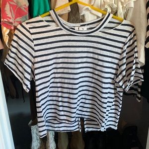 Detailed Black and White Striped Shirt with Shoulder and Back details.